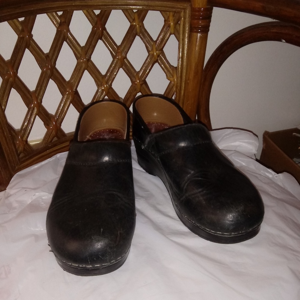 Woman Dansko cloggs